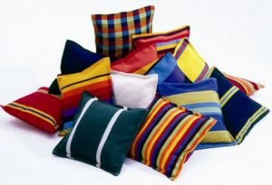 Decorative cushions laid out in a pile