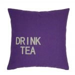 Purple cushion cover with drink tea text