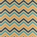 Close up of blue and yellow chevron cushion cover