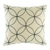 light coloured cushion cover with fine black circles that interlock