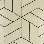 Zoomed in image of light cushion cover with stitch like patterning