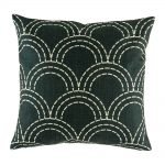Dark cushion with sweeping semi circle pattern in light colours on dark background