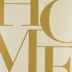 Close up of cushion with gold HOME text