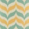 Close up of yellow and green zig zag pattern cushion cover