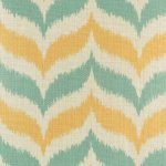Close up of yellow and green zig zag pattern cushion cover