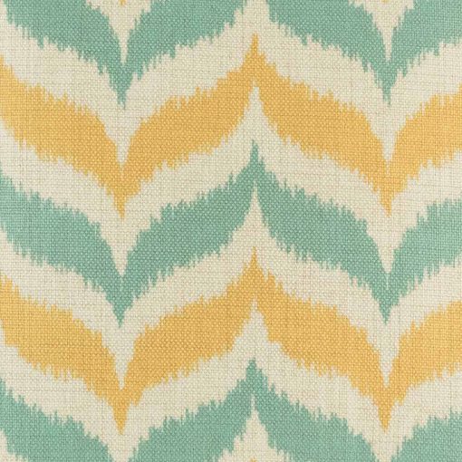 Close up of yellow and green zig zag pattern cushion cover