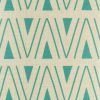Close up of teal triangle patterned cushion cover