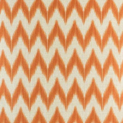 Close up view of orange zig zag cushion cover