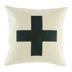 Striking black cross on middle of cushion cover