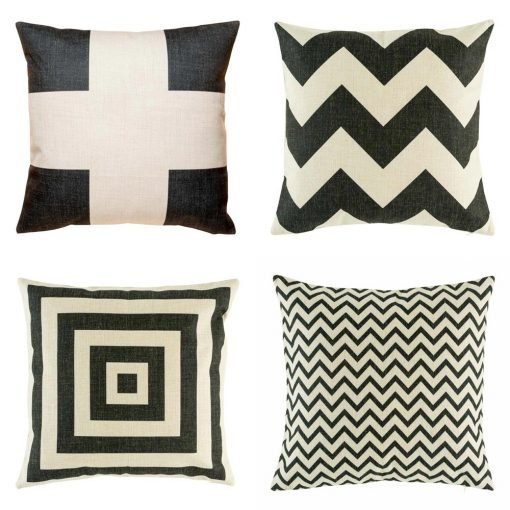 Collection of four cushion covers with black prints