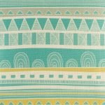 Close up of teal and yellow striped cushion cover