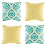 Dandy cushion set containing 2 yellow cushions and 2 teal