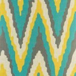 Close up of teal, yellow and grey chevron cushion cover