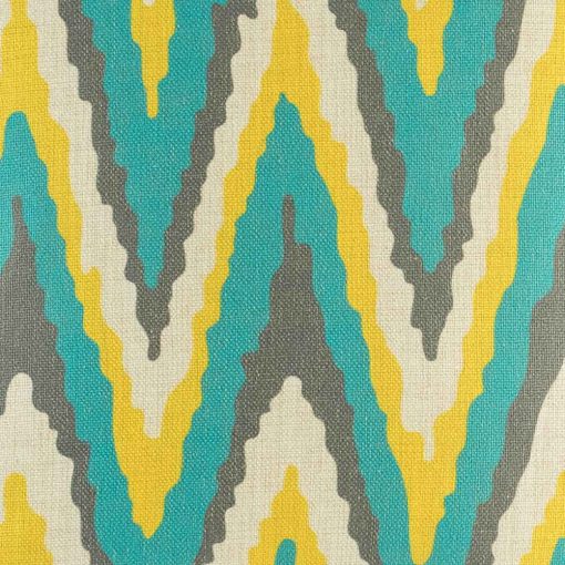 Close up of teal, yellow and grey chevron cushion cover
