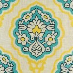 Close up of blue and yellow flower pattern on cotton linen cushion