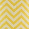 Close up view of yellow chevron design on cushion cover