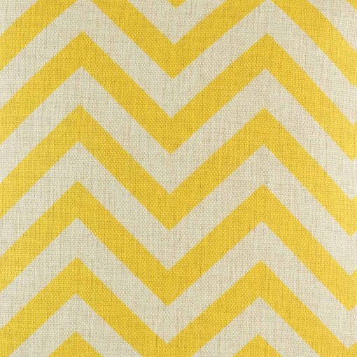 Close up view of yellow chevron design on cushion cover