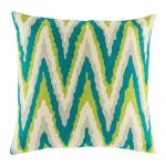 Teal and green zig zag pattern on cushion cover