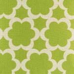 Close up of green flower pattern on cotton linen cushion cover