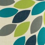Close up of teal and green pattern on cushion cover