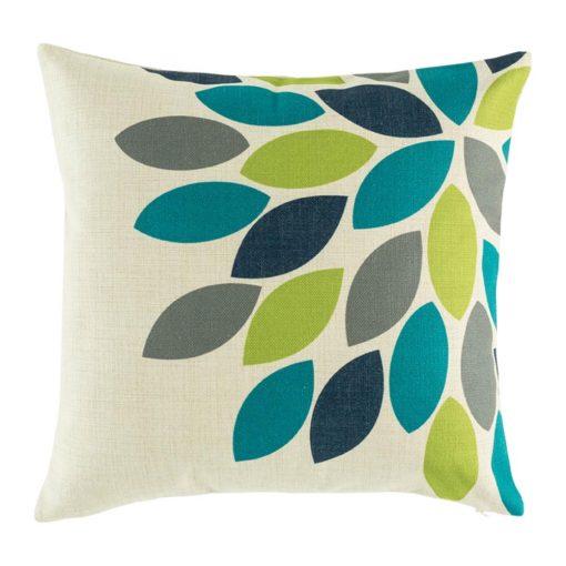 Leaf pattern on cushion cover with green teal and dark blue