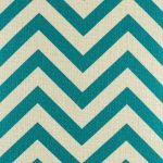 Close up of teal zig zag pattern on cushion cover