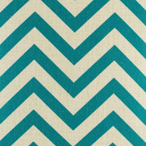 Close up of teal zig zag pattern on cushion cover