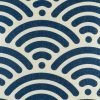 Close up of blue shell pattern on cushion