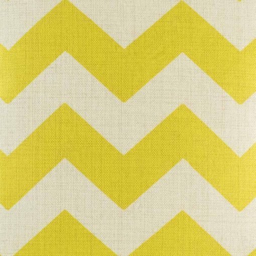 Close up of yellow zig zag pattern cushion