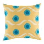Yellow cushion cover with blue polka dots