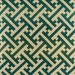 Close up of green jagged design on cushion cover