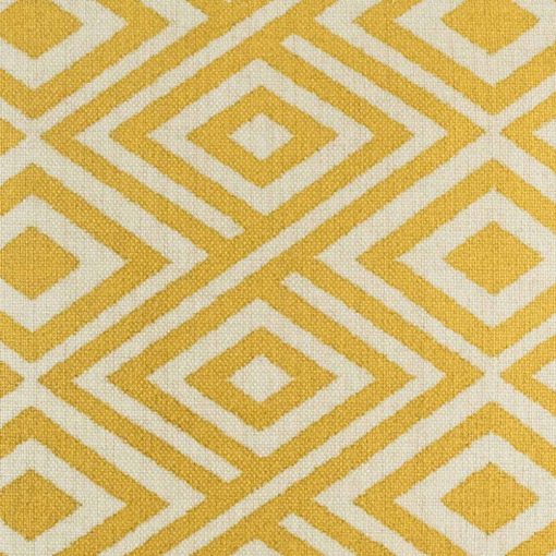 Close up of yellow decorative cushion cover with diamond pattern