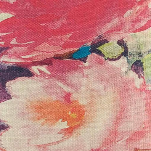 Close up of cushion cover showing watercolour like pink flowers