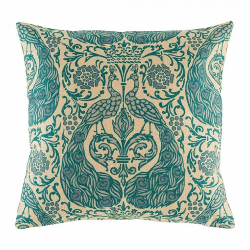Close up pattern on cushion with turquoise peacock pattern