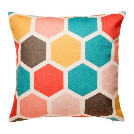 Hexagon pattern in teal yellow pink and red on cushion cover