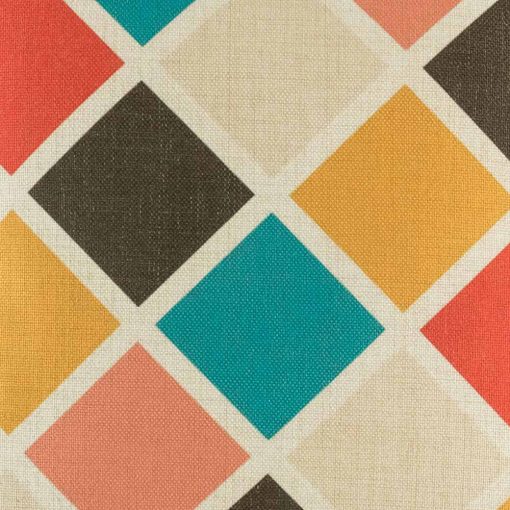 Close up of diamond pattern in teal dark brown yellow and pink on cushion cover