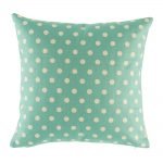 Teal cushion cover with polka dot pattern