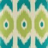 Close up shot of teal and green print on decorative cushion cover