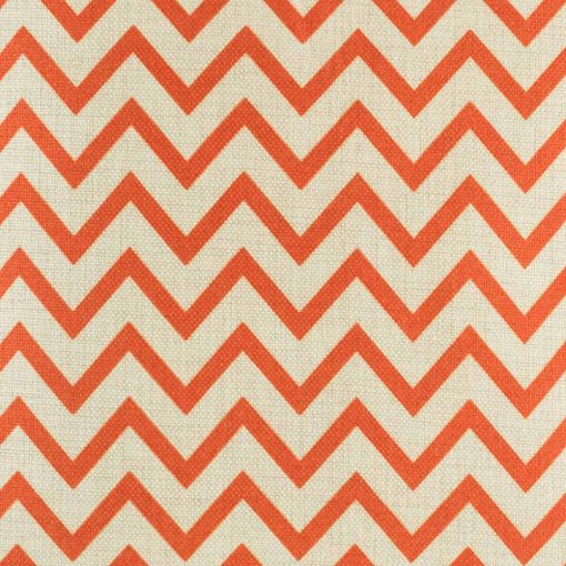 Close up swatch of orange and red zigzag cushion