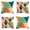 Bold 4 cushion cover set with geometric patterns in rich pastel colours