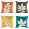 Set of 4 cushions with leaf print