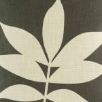 Close up of brown cushion cover with leaf
