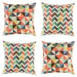 Collection of four colourful cushion covers with diamond and chevron patterns