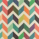 Close up view of colourful chevron cushion cover with rainbow colours