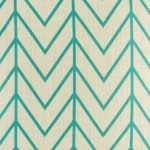 Close up of teal arrows on cushion cover
