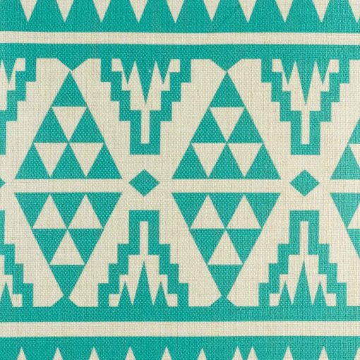 Close up of teal cushion cover with triangular patterning