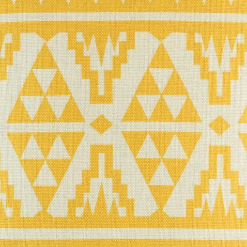close up of yellow print on scatter cushion cover