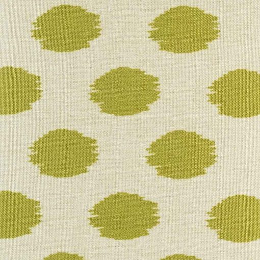 green gold polka pattern up close on cushion cover