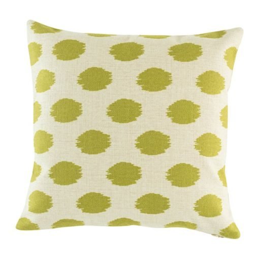 Light coloured cushion cover with freehnad polka dots