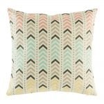 Soft colours of pink, brown and yellow arrows on cushion cover